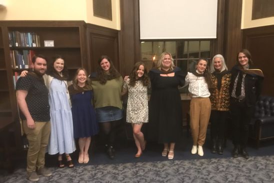 Curtain call in the Milano Room.  From left to right, Gabriel Bass in poetry, Caroline Riley in poetry, Rachael Bradley in nonfiction, Morgan Roediger in fiction, Kasey Shaw in nonfiction, Katie Clendenin in nonfiction, Shay Reynolds in poetry, Karen Klei